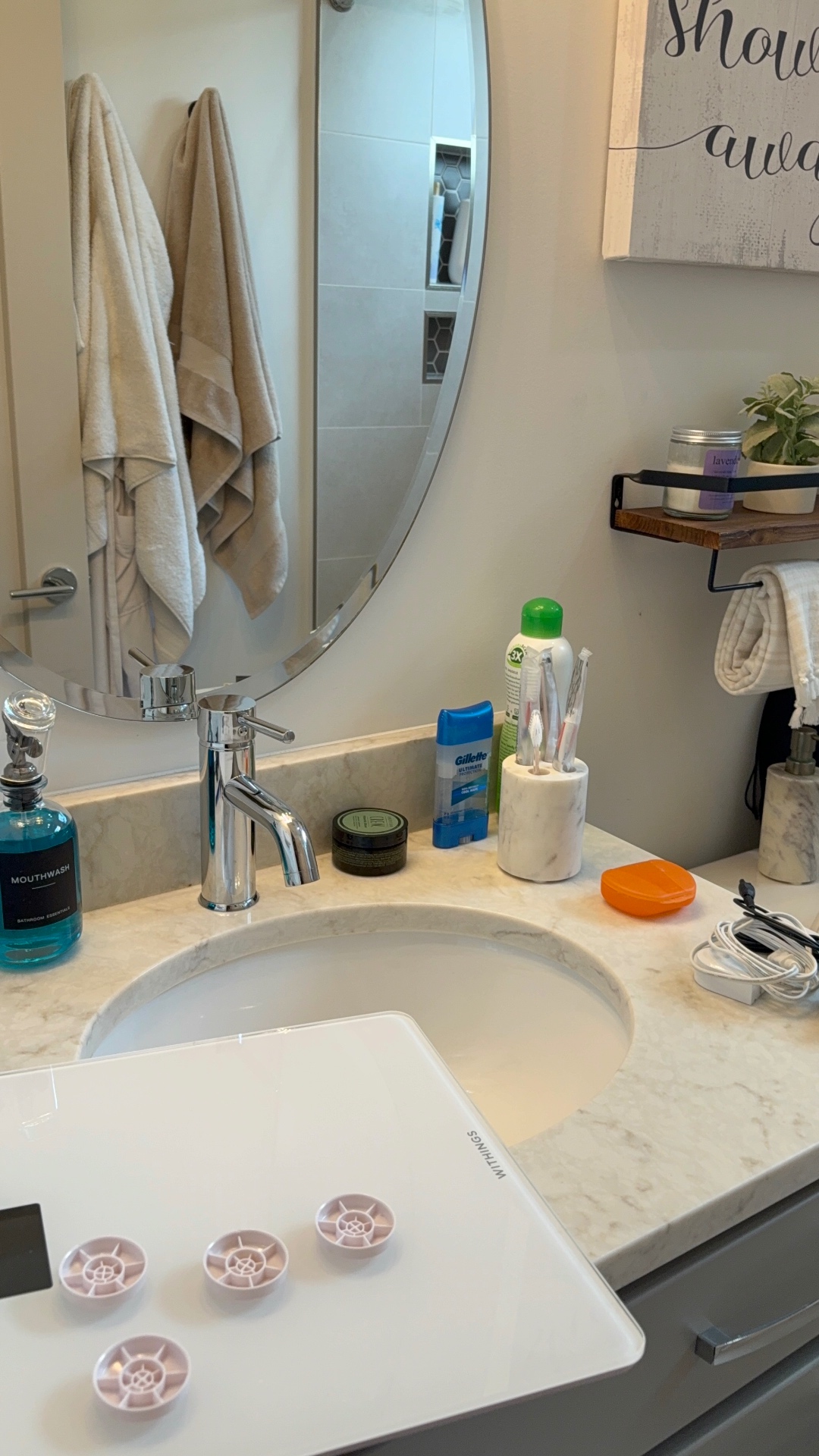 Bathroom sink and countertop with everyday items